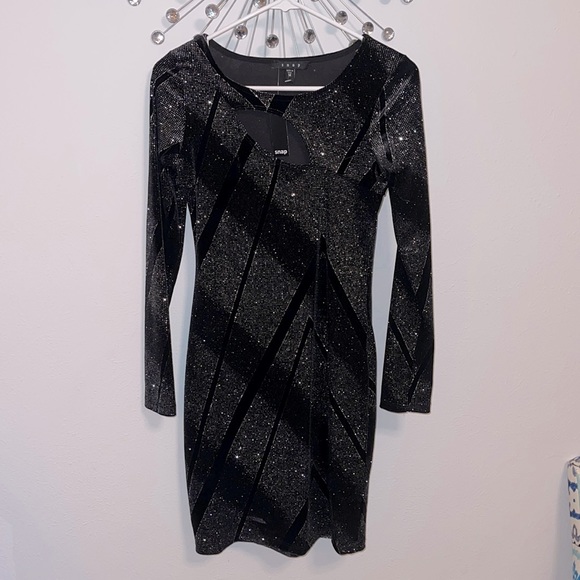 Snap Dresses & Skirts - New! Black Dress with cutout and silver shimmer NWT
